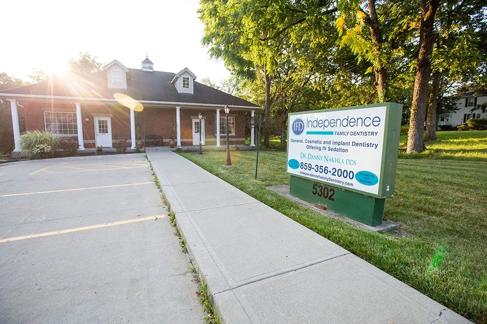 The Independence Family Dentistry building and signage at golden hour