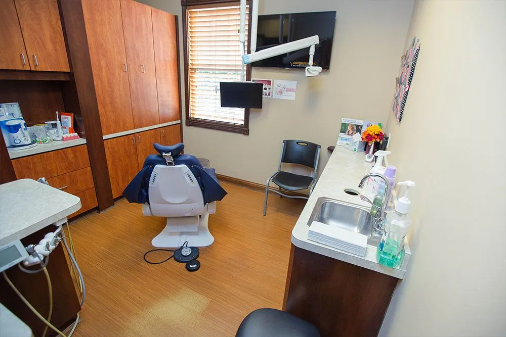 A modern treatment room with digital imaging and natural light